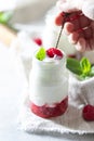 Fermented drink kefir, yogurt in a glass jar on a light background. Probiotic cold fermented dairy drink Royalty Free Stock Photo