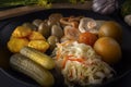 Fermented foods cabbage, peppers, pickles, tomatoes, mushrooms, zucchini, garlic in a large wooden dish on a dark table Royalty Free Stock Photo