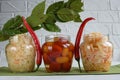 Fermented foods. Sauerkraut, salted tomatoes on a white background. Vegetarian food