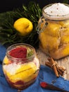 Fermented lemons in jars with salt, bay leaf, paprika and coriander. Probiotics, dairy products. Moroccan salted lemons. Fresh,