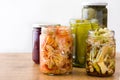 Fermented preserved vegetables in jar on wood Royalty Free Stock Photo