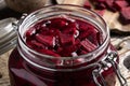 Fermented red beets in a glass jar