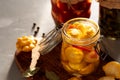 Fermented yellow squash vegetable in a glass jar. The concept of canned food. Garlic in the foreground Royalty Free Stock Photo