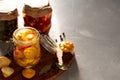 Fermented yellow squash vegetable in a glass jar. The concept of canned food. Garlic in the foreground Royalty Free Stock Photo