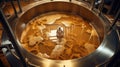 Fermenting of a beer in an open fermenters in a brewery.