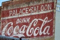 Palace Saloon ad with Coca Cola