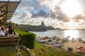 Sunset view of Praia do Porto with Morro do Pico on background from Mergulhao Restaurant - Fernando de Noronha, Pernambuco, Brazil