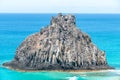 Fernando de Noronha, Brazil. View of single rock of Morro dos Dois Irmaos with crystal clear ocean