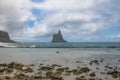 People snorkeling at Atalaia Beach with Morro do Frade on Background - Fernando de Noronha, Pernambuco, Brazil