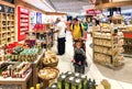 Duty Free Shop, passengers make purchases before departure in Milan Malpensa International Airport. Royalty Free Stock Photo