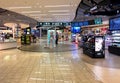 Duty Free Shop, passengers make purchases before departure in Milan Malpensa International Airport. Royalty Free Stock Photo