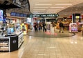 Duty Free Shop, passengers make purchases before departure in Milan Malpensa International Airport. Royalty Free Stock Photo