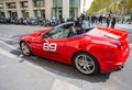 Ferrari California luxury coupe sports car rental along the Champs-Elysee. Travel and tourism