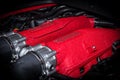 Ferrari engine logo inside the sports car showcased at the Brussels Expo Autosalon motor show. Belgium - January 12, 2016