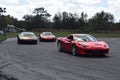 Ferrari, Lamborghini and McClaren at a track in Florida Royalty Free Stock Photo