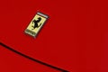Ferrari logo on red sport car