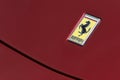 Ferrari logo on red sport car