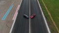 Ferrari 488 Pista and McLaren 720s on a racetrack