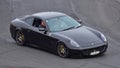 Ferrari 612 Scaglietti driving around circuit at Ferrari Challenge Asia Pacific Series race on April 15, 2018 in Hampton Downs Royalty Free Stock Photo