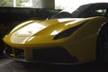 Ferrari 488 spider yellow front view