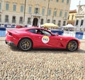 Ferrari Tribute cars pass through Piazza Sordello in Mantua, Italy