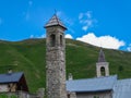 Ferrere - Stone tower and houses in small remote alpine village of Ferrere in valley Valle Stura Royalty Free Stock Photo