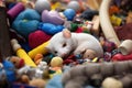 a ferret sleeping soundly among a pile of toys Royalty Free Stock Photo