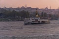 Ferries of istanbul, also known as vapur. Marmara sea and Istanbul cityscape in the background. Bosphorus ride