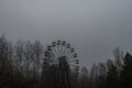 Ferris wheel in abandoned amusement park in a ghost town Pripyat, Ukraine. Chornobyl exclusion zone Royalty Free Stock Photo