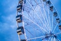 Ferris Wheel against a blue sky