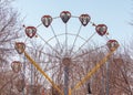 Ferris wheel against the blue sky, close-up, vertical Royalty Free Stock Photo