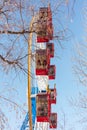 Ferris wheel against the blue sky, close-up, vertical Royalty Free Stock Photo