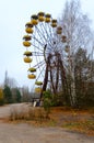 Ferris wheel in amusement park in dead abandoned ghost town of Pripyat, Chernobyl exclusion zone, Ukraine Royalty Free Stock Photo