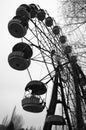 Ferris wheel in amusement park in dead abandoned ghost town of Pripyat, Chernobyl exclusion zone, Ukraine Royalty Free Stock Photo