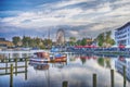 Ferris Wheel, amusement park and ferry boat in Schwerin Lake Royalty Free Stock Photo