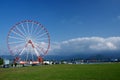 Ferris wheel on Batumi seafront with Caucasus mountains,Georgia Royalty Free Stock Photo