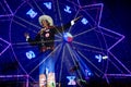 Ferris wheel and Big Tex at State Fair of Texas night