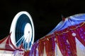 Ferris wheel and big top tent at night Royalty Free Stock Photo