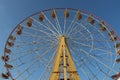 Ferris wheel. Big wheel. Blue sky. Funny day. Amusement park Royalty Free Stock Photo
