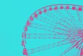 Ferris wheel on the blue background duotone image