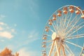 Ferris wheel on blue sky background. Vintage toned picture, Vintage ferris wheel on blue sky background in the park, AI Generated