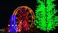 Ferris Wheel With Bright Illumination Spinning At