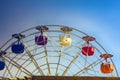 Ferris wheel with colored cabins