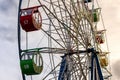 Ferris wheel with colorful cabs against the sky Royalty Free Stock Photo