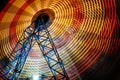 Ferris Wheel at county fair at night, motion blurred Royalty Free Stock Photo