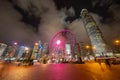 The ferris wheel, Hong Kong Observation Wheel at night, and amusement park for kids in holiday vacation and travel trip concept. Royalty Free Stock Photo