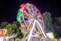 Ferris wheel lights at state fair at  night Royalty Free Stock Photo