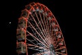 Ferris wheel and the moon. Black sky background. Royalty Free Stock Photo