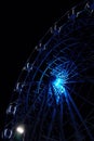 Ferris wheel at night with blue illumination Royalty Free Stock Photo