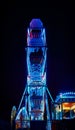 Ferris wheel at night with blue light